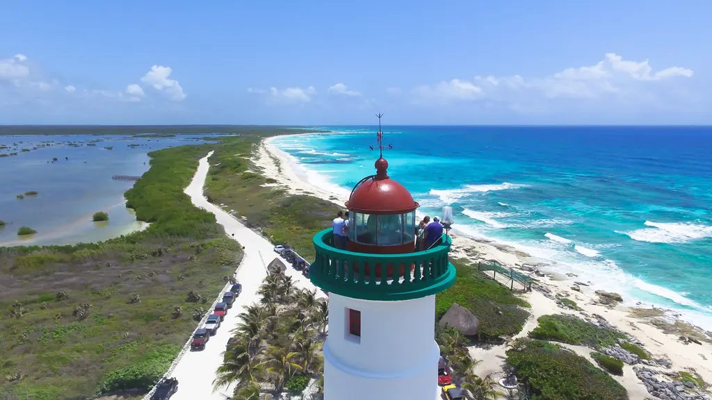 Celarain lighthouse and Punta Sur beach from above